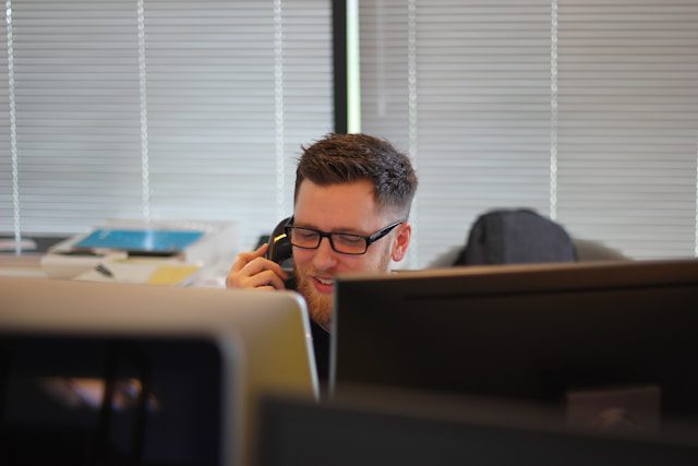 Customer service representative taking a phone call